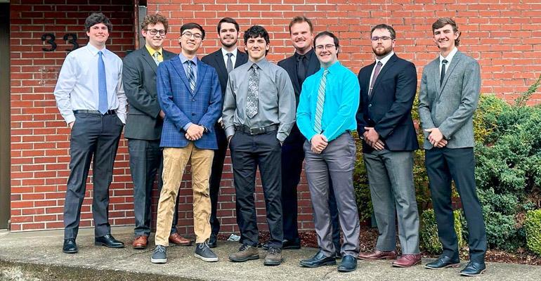 Alpha Gamma Rho Members Standing Outside Alpha Beta Chapter House at Oregon State UniversityMembers of