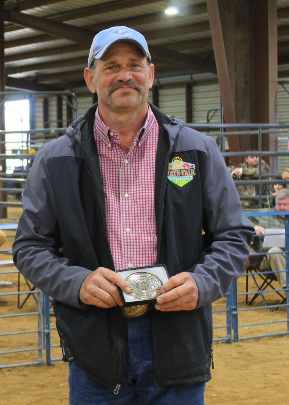  4-H/FFA Fredericksburg Junior Livestock Show and Sale recognized Alpha Gamma Rho Brother Glenn Martin for his contributions to the event.