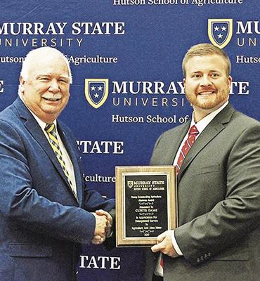 (left) Hutson School of Agriculture Dean Dr. Tony Brannon (right) Curtis Dame. Photo from Murray Ledger