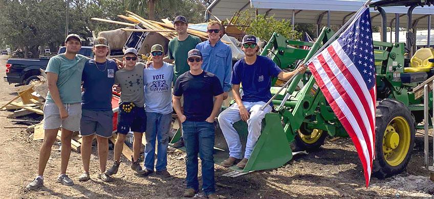 Alpha Gamma Rho members assist with Hurricane Idalia recovery.